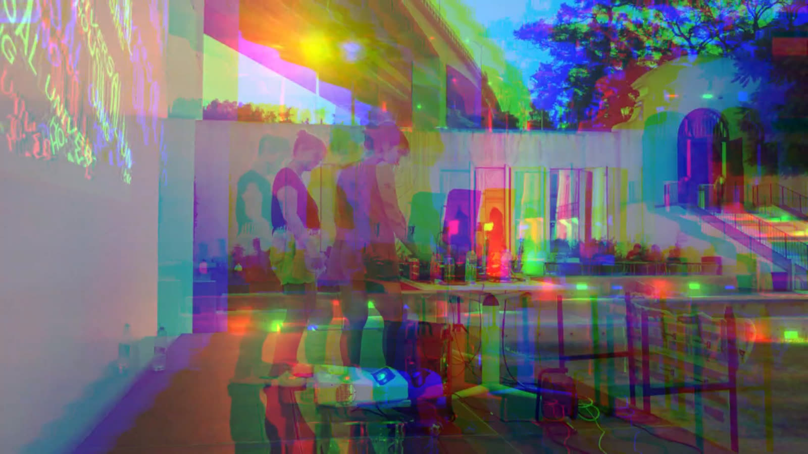 Live camera of the setup in a courtyard, washed in RGB-shifted colour